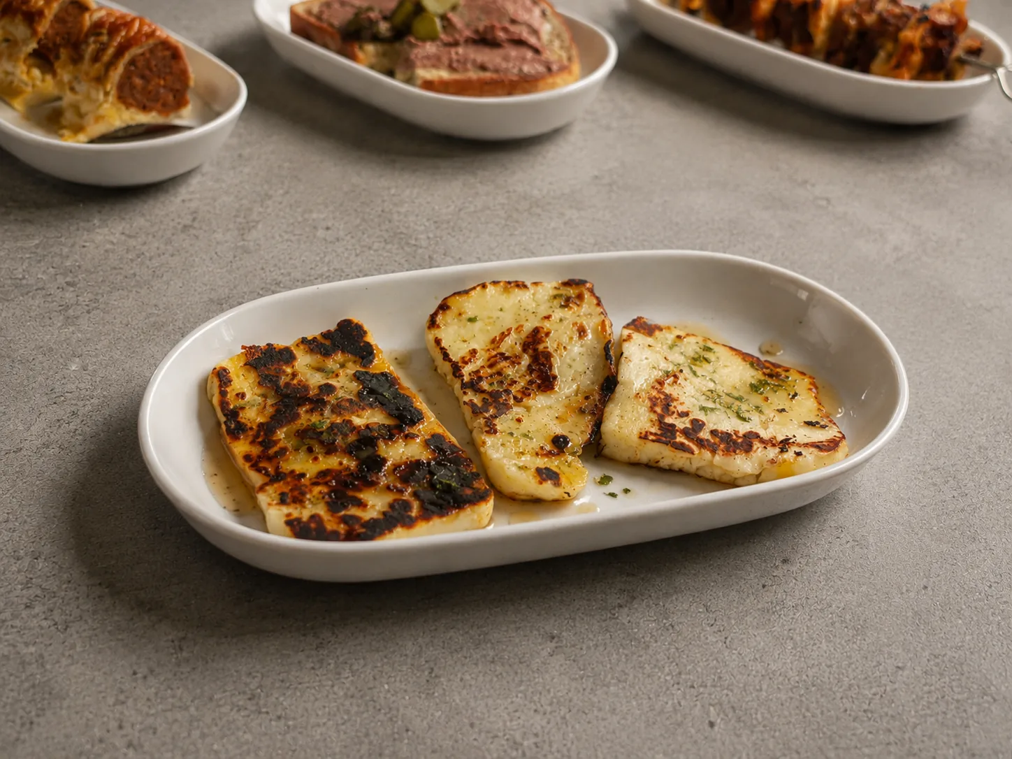 Grilled halloumi grazing platter from the galley on a Gold Coast sailing voyage aboard VOYŌ