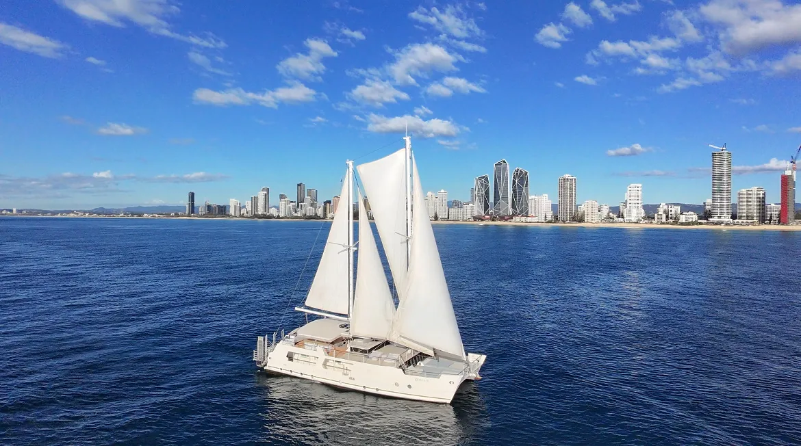 The upper deck of Gold Coast sailing superyacht VOYŌ under full sail
